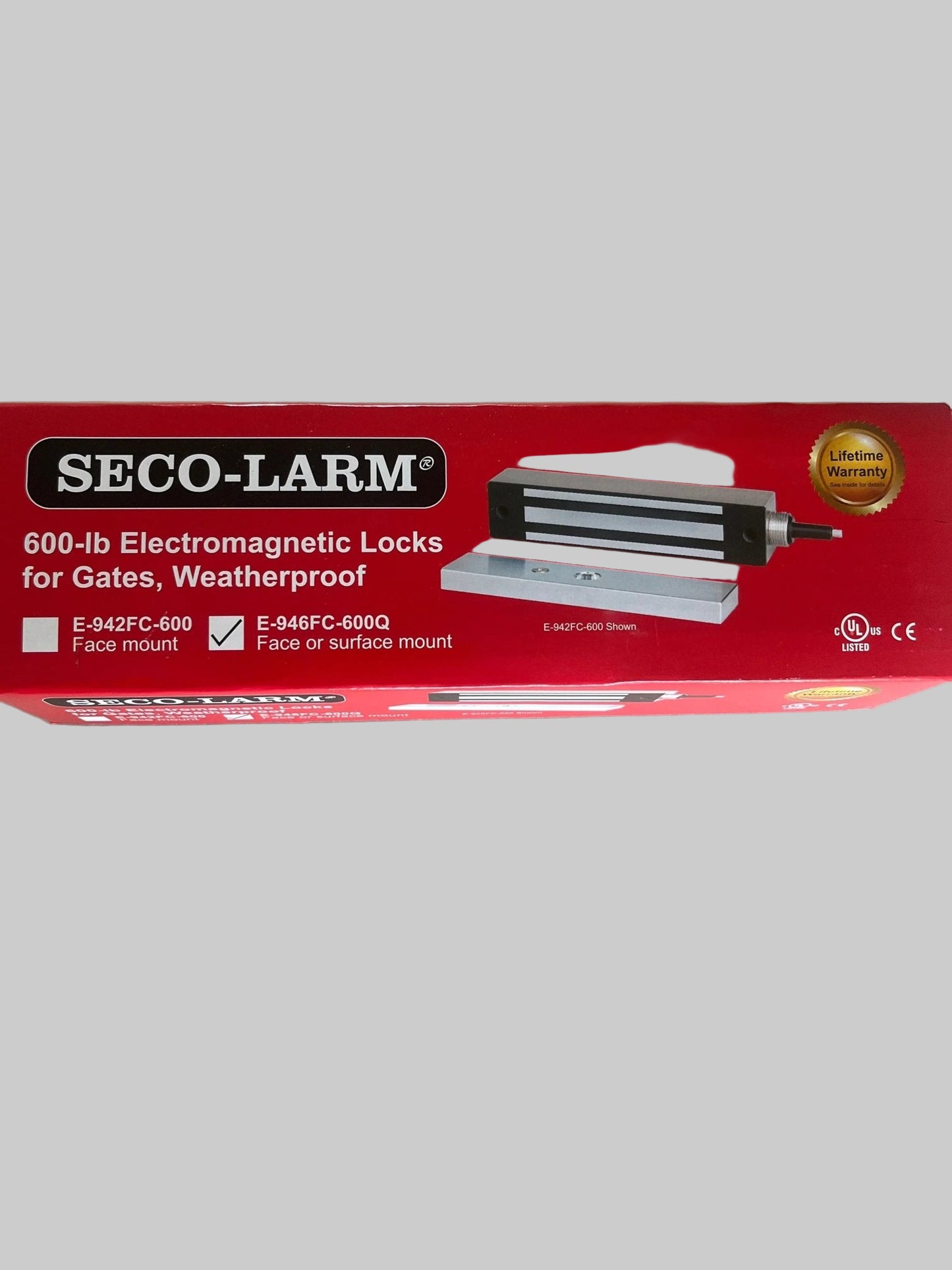 SECO-LARM 600-lb weatherproof electromagnetic lock for outdoor gates, fail-safe maglock with mounting hardware for access control.